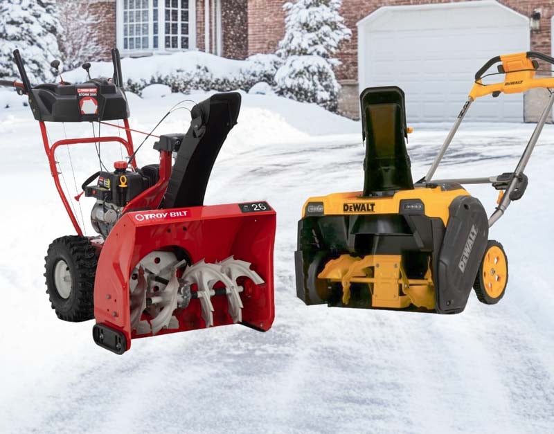 Snow Blowers on a driveway